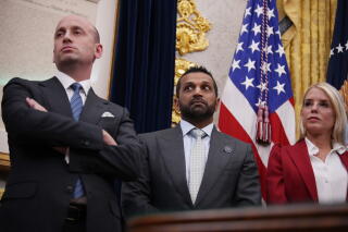 White House Deputy Chief of Staff Stephen Miller, left, FBI Director Kash Patel and Atty. Gen. Pam Bondi in the Oval Office.