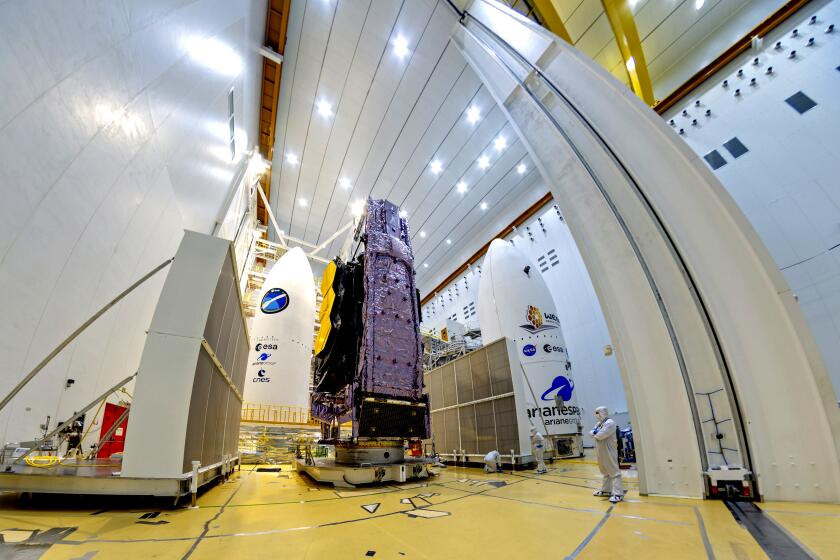The NASA James Webb Space Telescope is mounted on top of the Ariane 5 rocket.