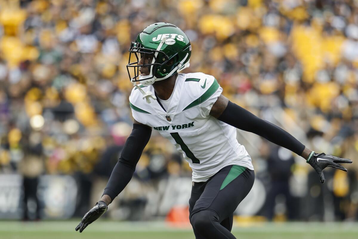 New York Jets cornerback Sauce Gardner lines up before a play.