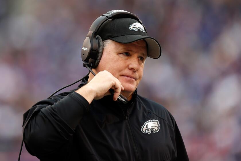 Eagles Coach Chip Kelly looks on during Philadelphia's season finale against the New York Giants on Dec. 28. The Eagles beat the Giants, 34-26.