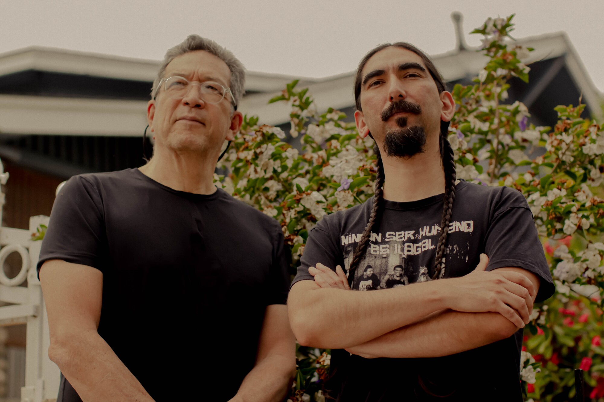 A photo of Sesshu Foster and Arturo Romo.