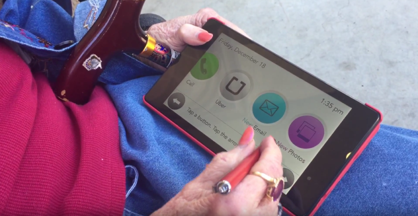 The senior-friendly GrandPad tablet showing a list of available apps.