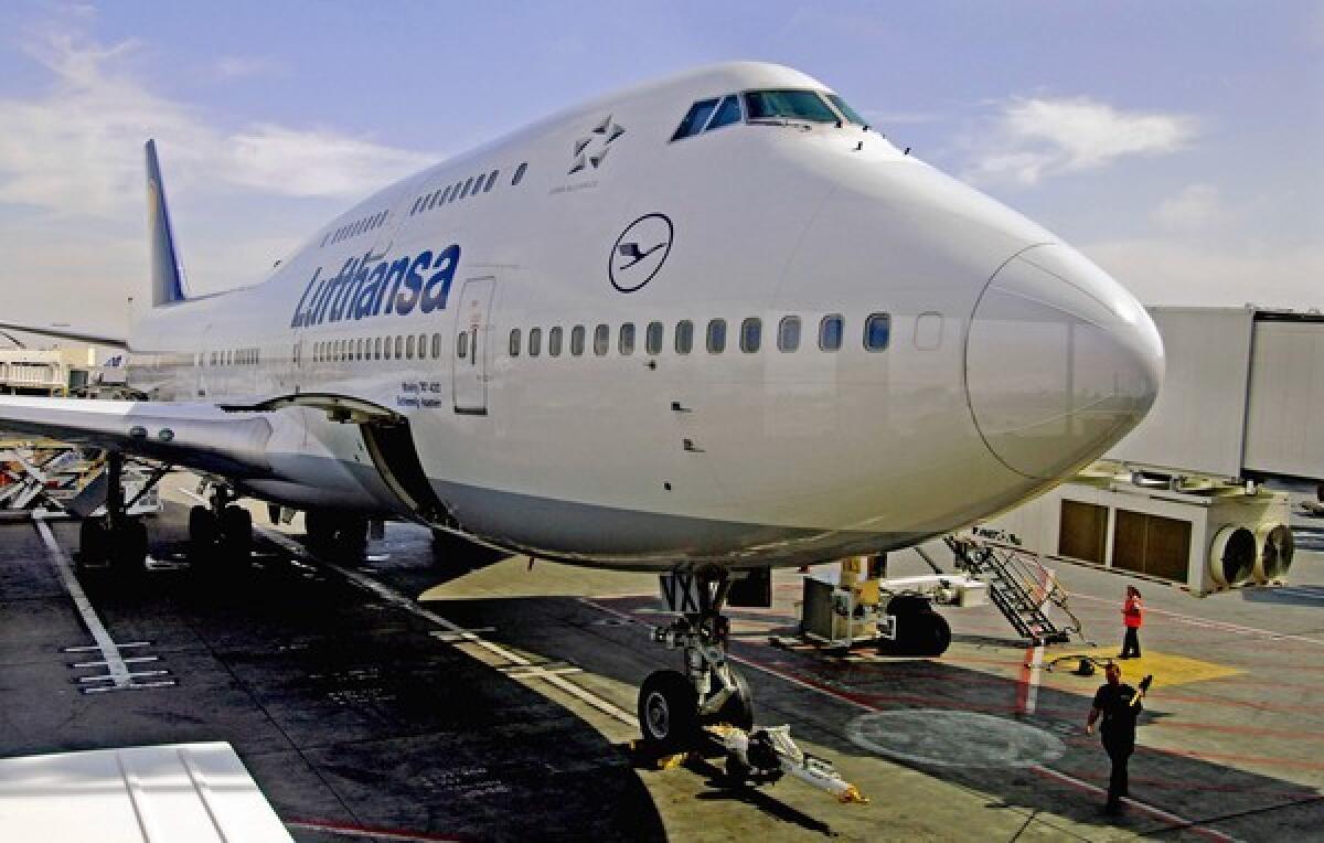 A Lufthansa 747-400 prepares for flight at LAX.