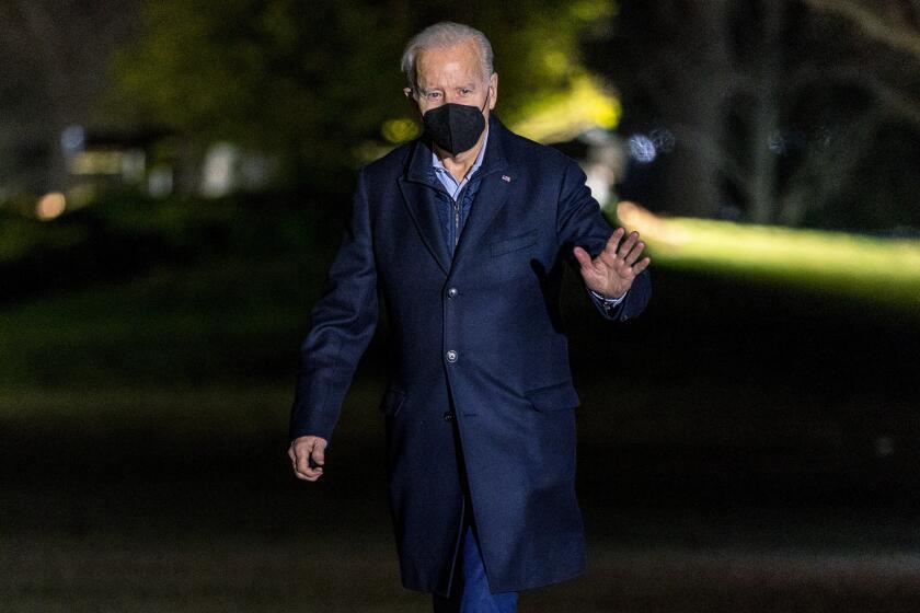 President Joe Biden arrives at the White House in Washington, Monday, Jan. 17, 2022, after spending the weekend in Wilmington, Del. (AP Photo/Andrew Harnik)