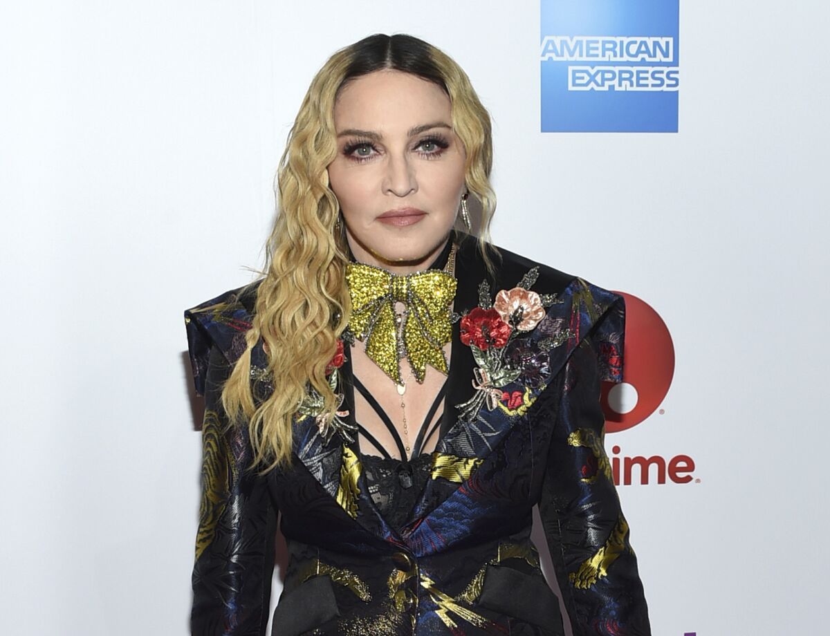 FILE - Madonna appears at the 11th annual Billboard Women in Music honors in New York on Dec. 9, 2016. Streaming service Paramount+ has landed a documentary that offers a glimpse into the personal life of Madonna and her work on the road.The streaming arm of ViacomCBS said Thursday that “Madame X” will make its debut in the U.S., Latin America, Australia, Nordic countries and Canada beginning Oct. 8. (Photo by Evan Agostini/Invision/AP, File)