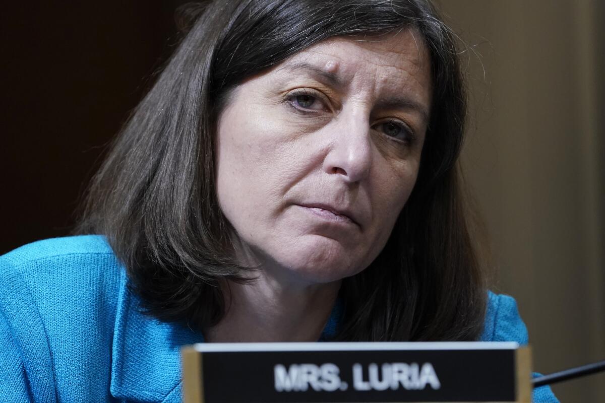 Rep. Elaine Luria (D-Va.) listens at a House panel hearing.