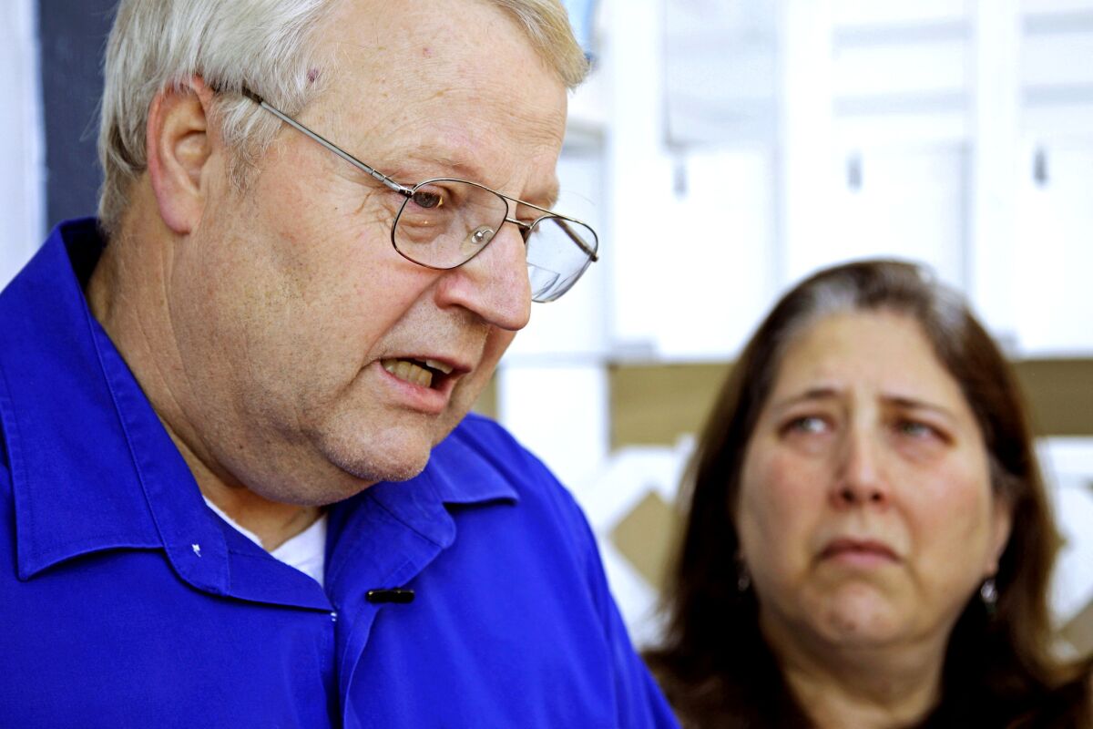 Chuck and Judy Cox, the parents of missing Utah mother Susan Powell, talk to reporters at their home in Puyallup, Wash. Their two young grandsons, Charles and Braden, were killed a day earlier by their father, Josh Powell, who then killed himself in a fire. Susan Powell went missing from her West Valley City, Utah, home in December 2009.