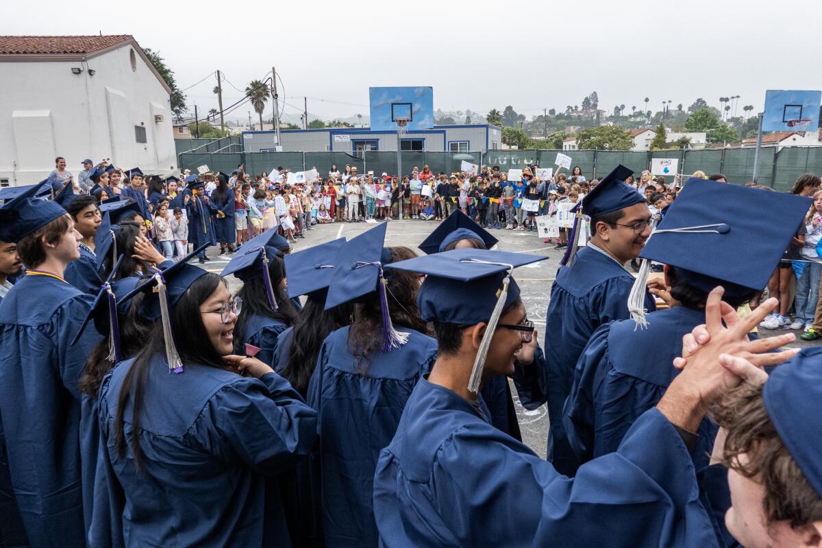 High school graduates attend a ceremony