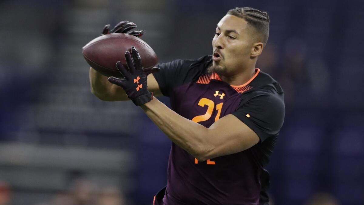 UCLA tight end Caleb Wilson runs a drill at the NFL scouting combine in Indianapolis on Saturday.