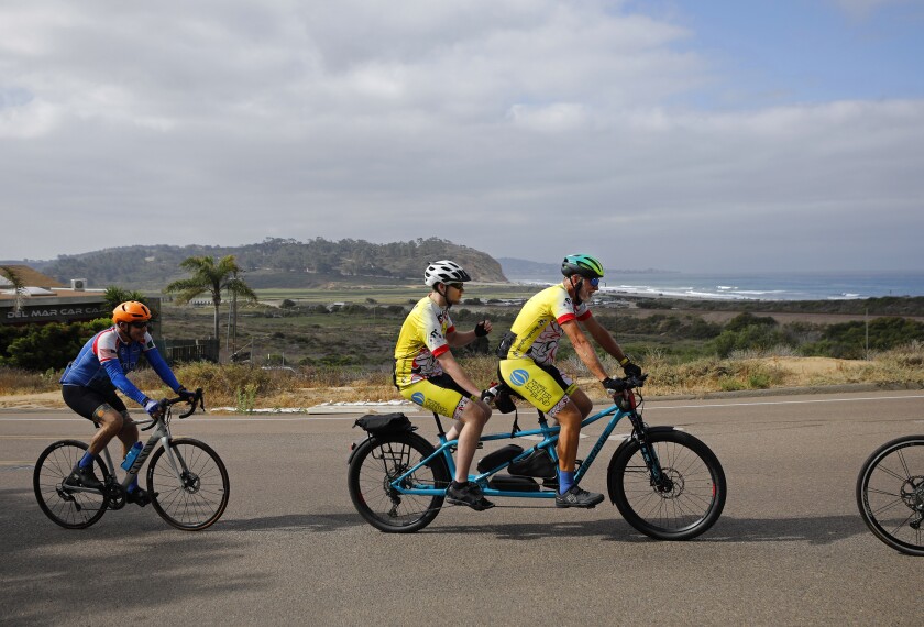 Blind Stokers tandem cycling partners Michael Griswold (left) and Ron Kelly set out on a 35 mile ride together.