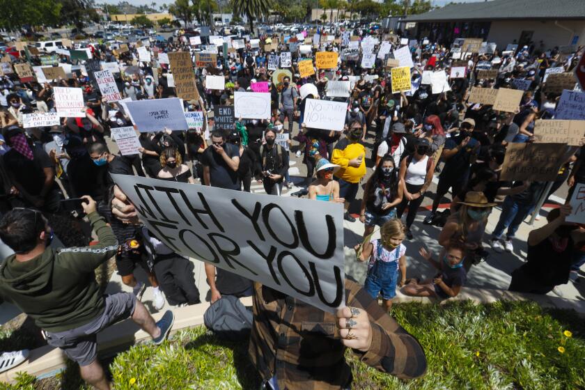 More than a thousand protestors demonstrated at the La Mesa Police Department on Saturday.