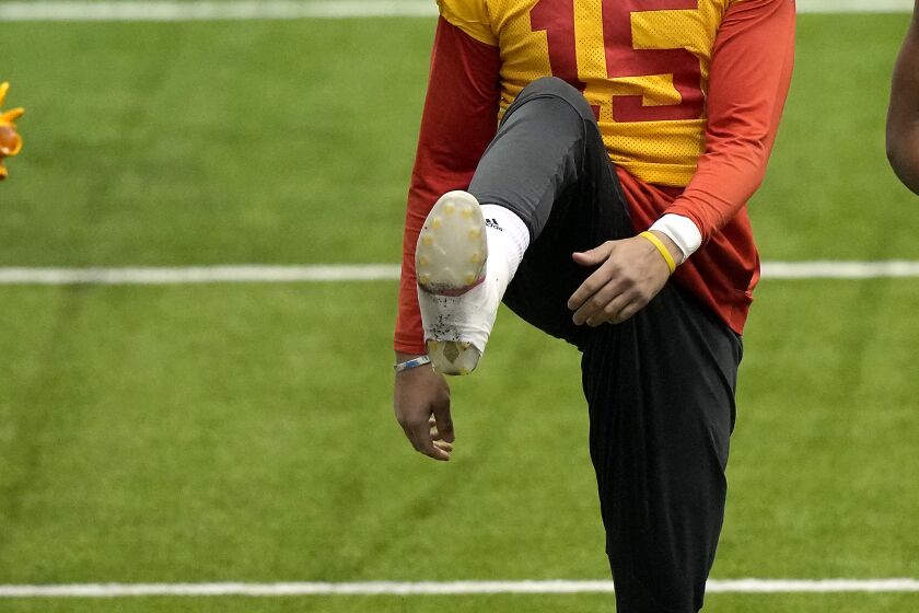 Kansas City Chiefs quarterback Patrick Mahomes stretches runs during an NFL football workout Thursday, Jan. 26, 2023, in Kansas City, Mo. The Chiefs are scheduled to play the Cincinnati Bengals Sunday in the AFC championship game. (AP Photo/Charlie Riedel)