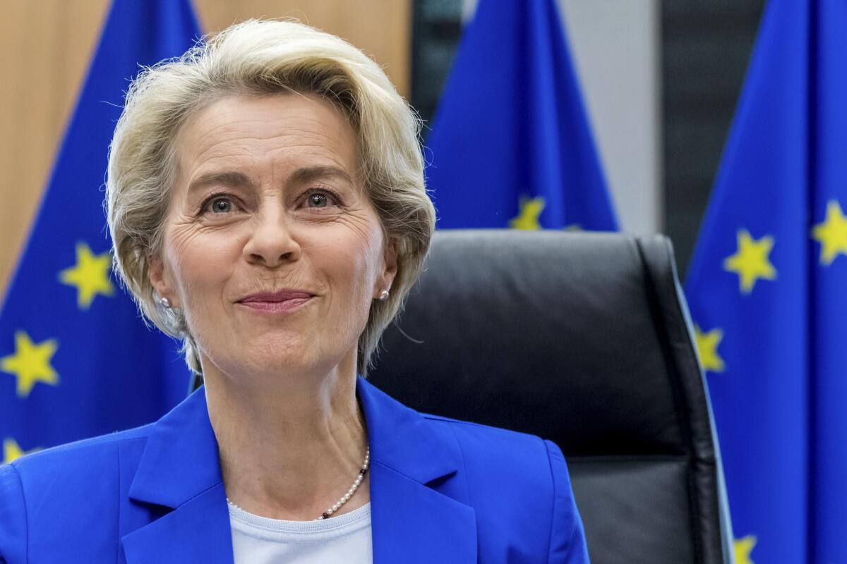 European Commission President Ursula von der Leyen smiles as she waits for the start of the weekly College of Commissioners meeting at the EU headquarters in Brussels, Wednesday, Nov. 9, 2022. (AP Photo/Geert Vanden Wijngaert)