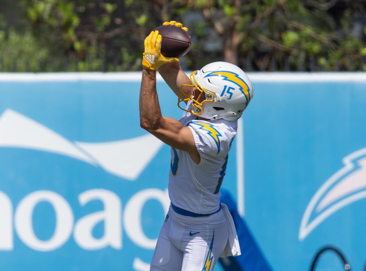 Chargers rookie wide receiver Ladd McConkey grabs a pass during spring practice.