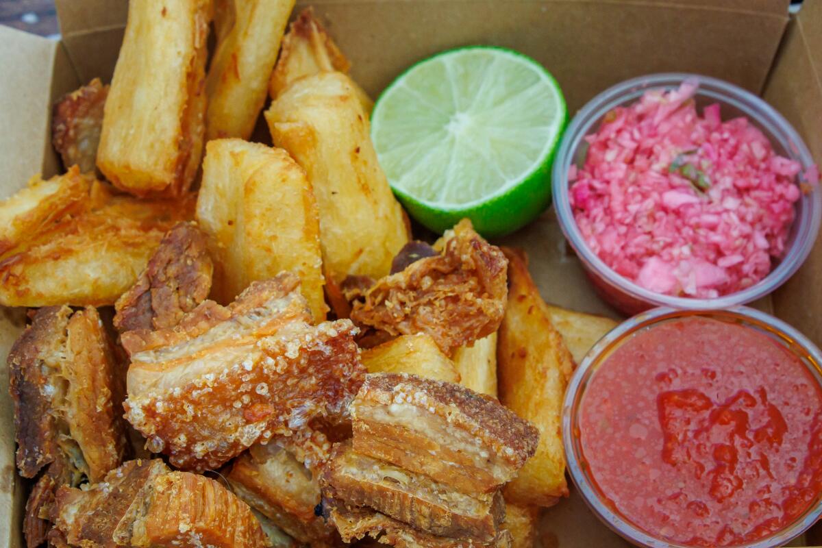 Yuca con chicharron from VChos Pupuseria Moderna.