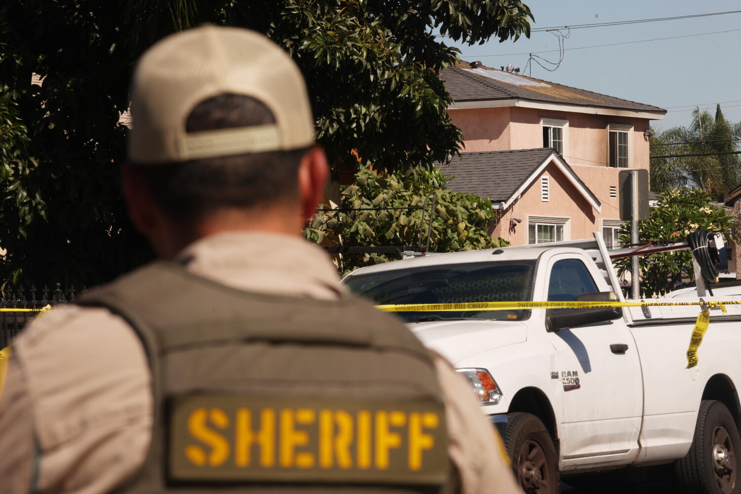 Three people, including a child, found dead from gunshots in burning home