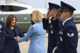Vice President Kamala Harris is greeted by Sen. Tammy Baldwin, D-Wisc., before boarding Air Force Two to depart on campaign travel to Milwaukee, Wisc., Tuesday, July 23, 2024 at Andrews Air Force Base, Md. (Kevin Mohatt/Pool via AP)