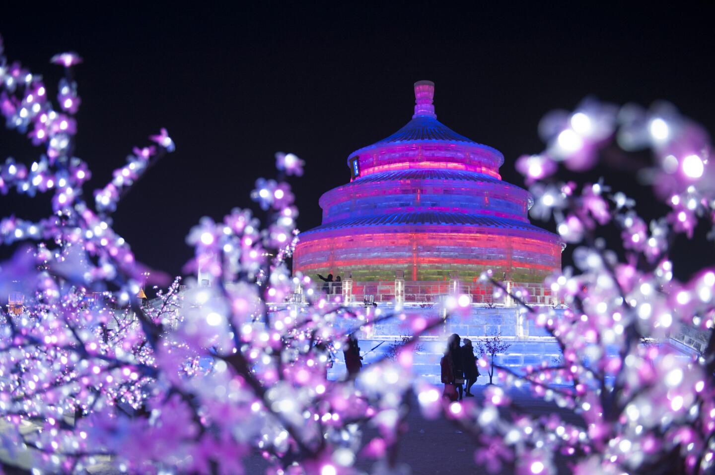 Light lends magic to the icy cityscape built for the Harbin International Ice and Snow Sculpture Festival.