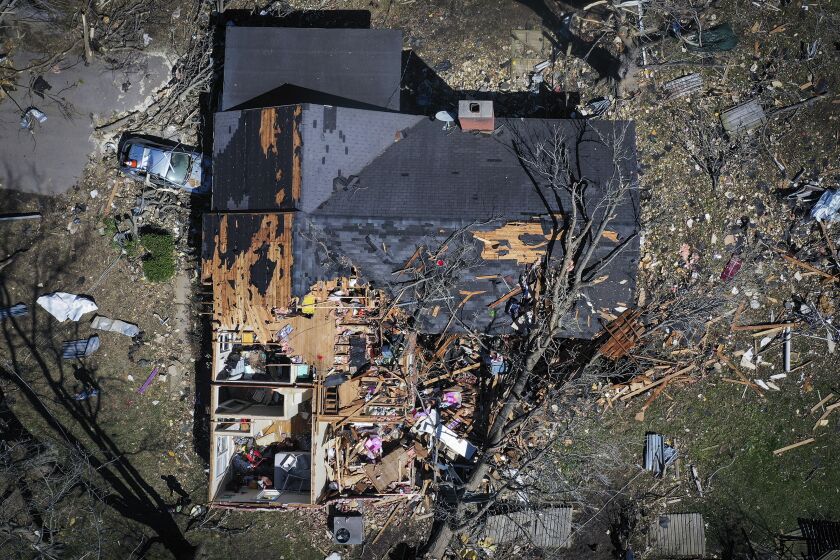A house is destroyed from a tornado in Covington, Tenn., Saturday, April 1, 2023. Storms that spawned possibly dozens of tornadoes have killed several people in the South and Midwest. (Patrick Lantrip/Daily Memphian via AP)