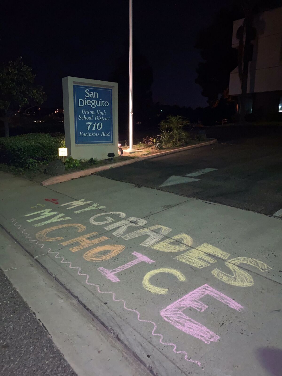 A message in chalk at the district office.