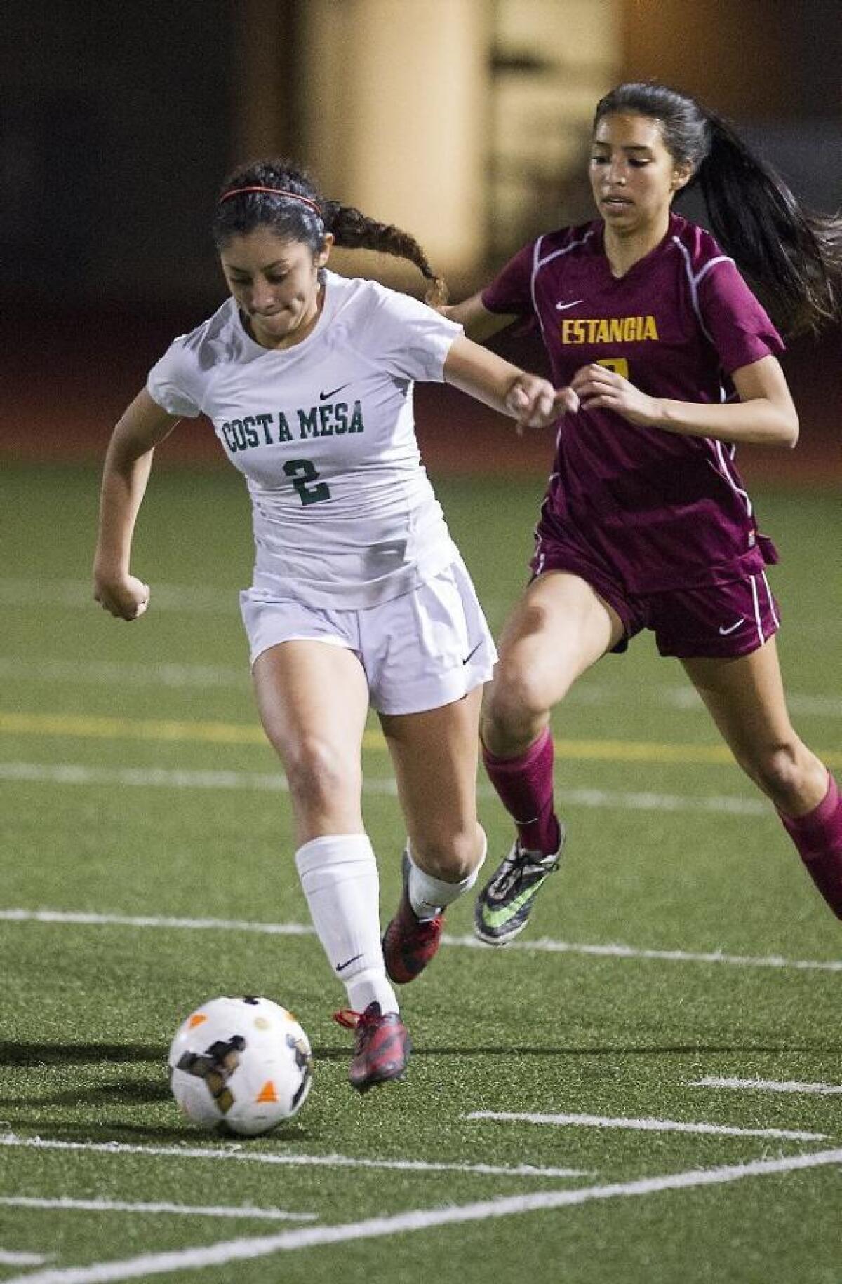 Emily Olvera competes for the Costa Mesa High girls' soccer team in 2016.