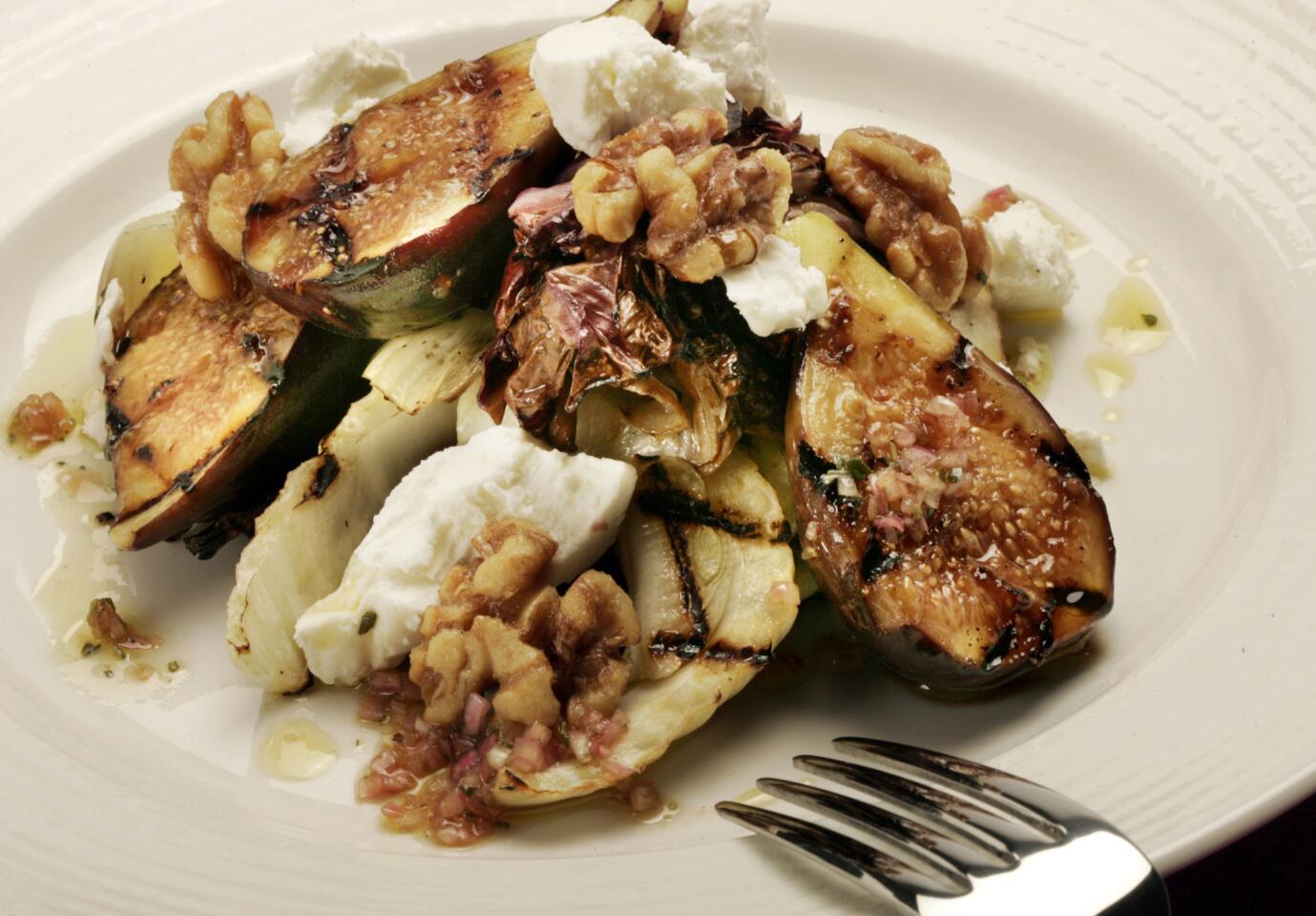 Grilled fig salad tossed with a sherry vinaigrette. Click here for the recipe.