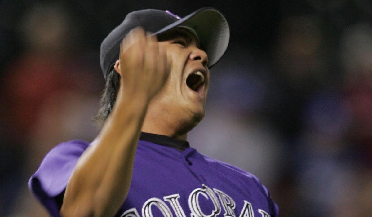 Colorado Rockies relief pitcher Chin-hui Tsao reacts during a 2005 game against the Dodgers.