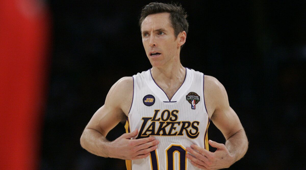 Los Angeles Lakers' Steve Nash, shown during a 2013 game against the Atlanta Hawks at Staples Center, has bought a house in Manhattan Beach.