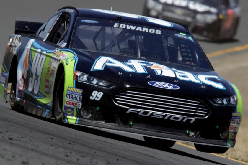 Carl Edwards posted his first career NASCAR road course race victory Sunday at Sonoma Raceway.