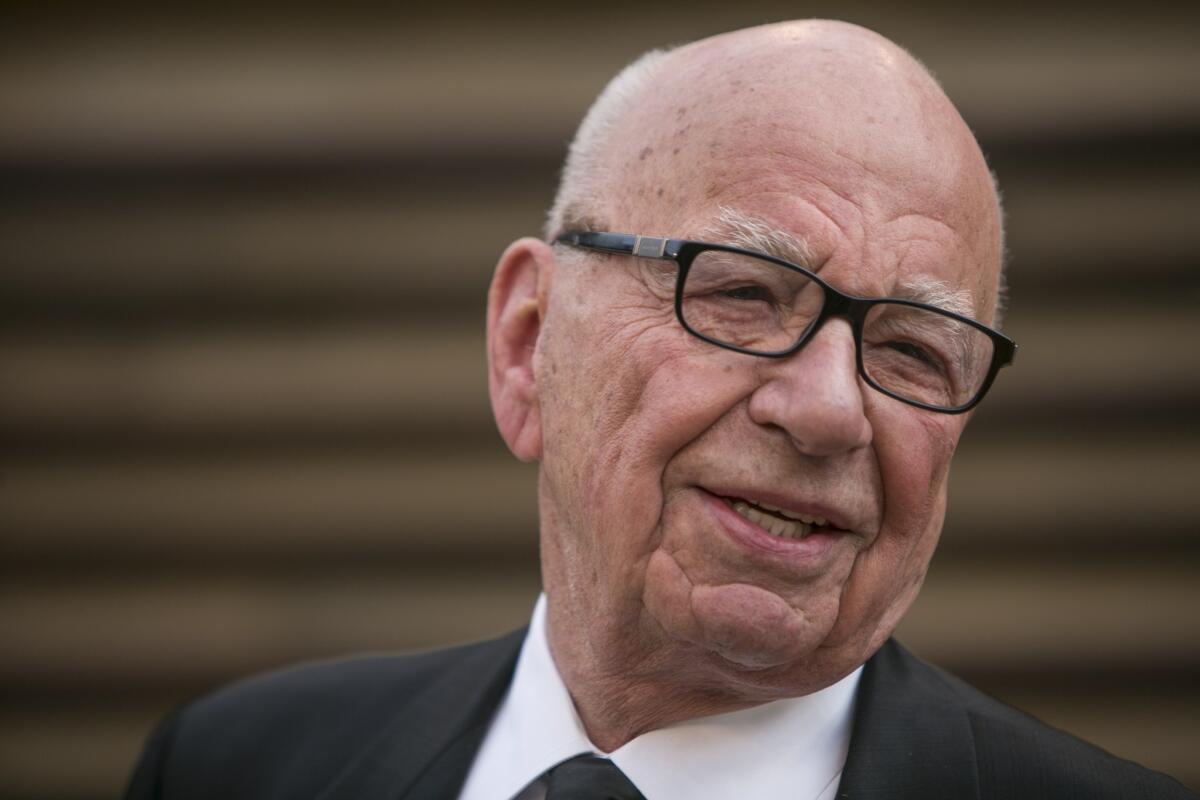 Rupert Murdoch arrives at Vanity Fair Oscar Party in West Hollywood on March 2, 2014.
