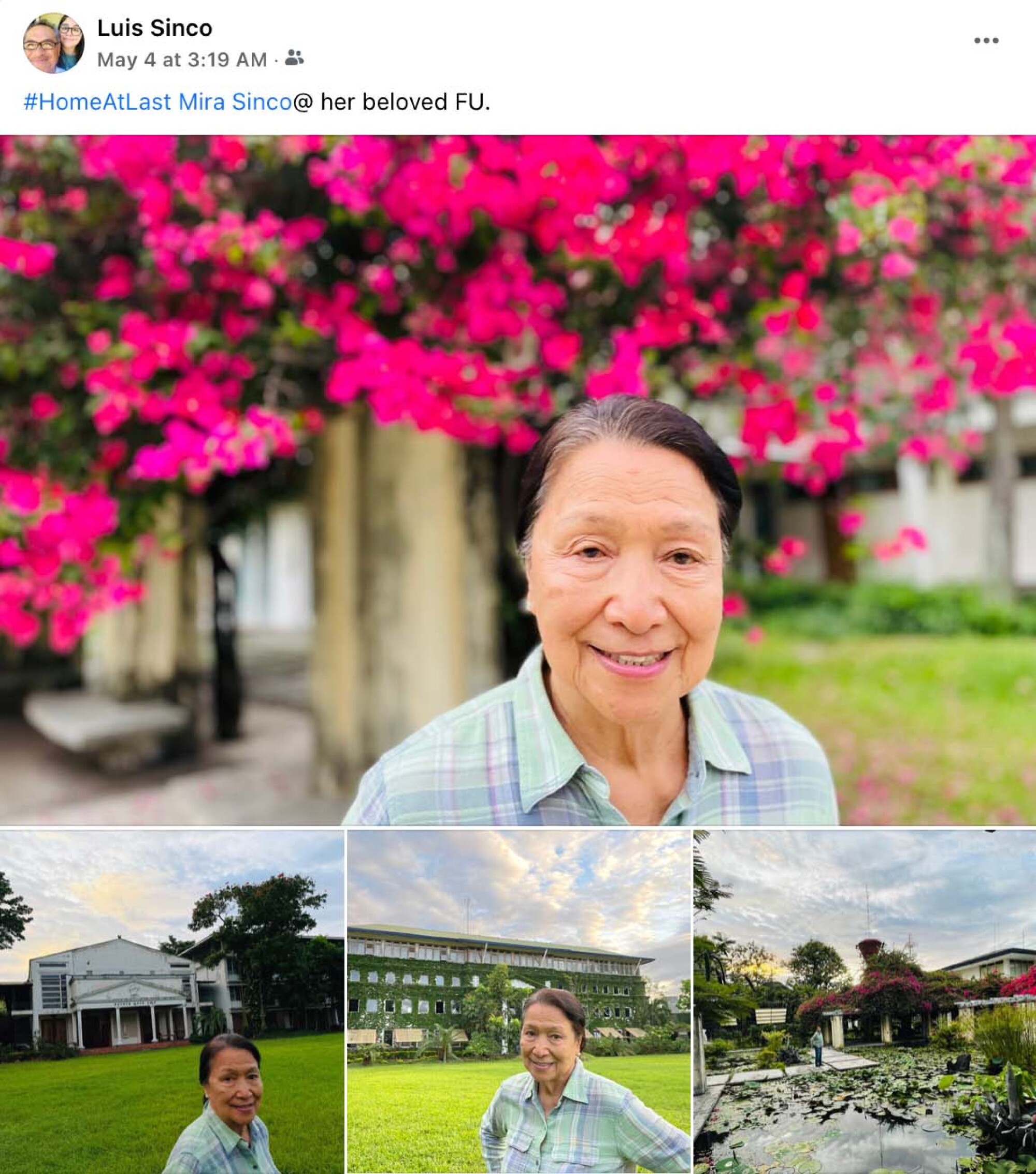 A woman in front of flowers.