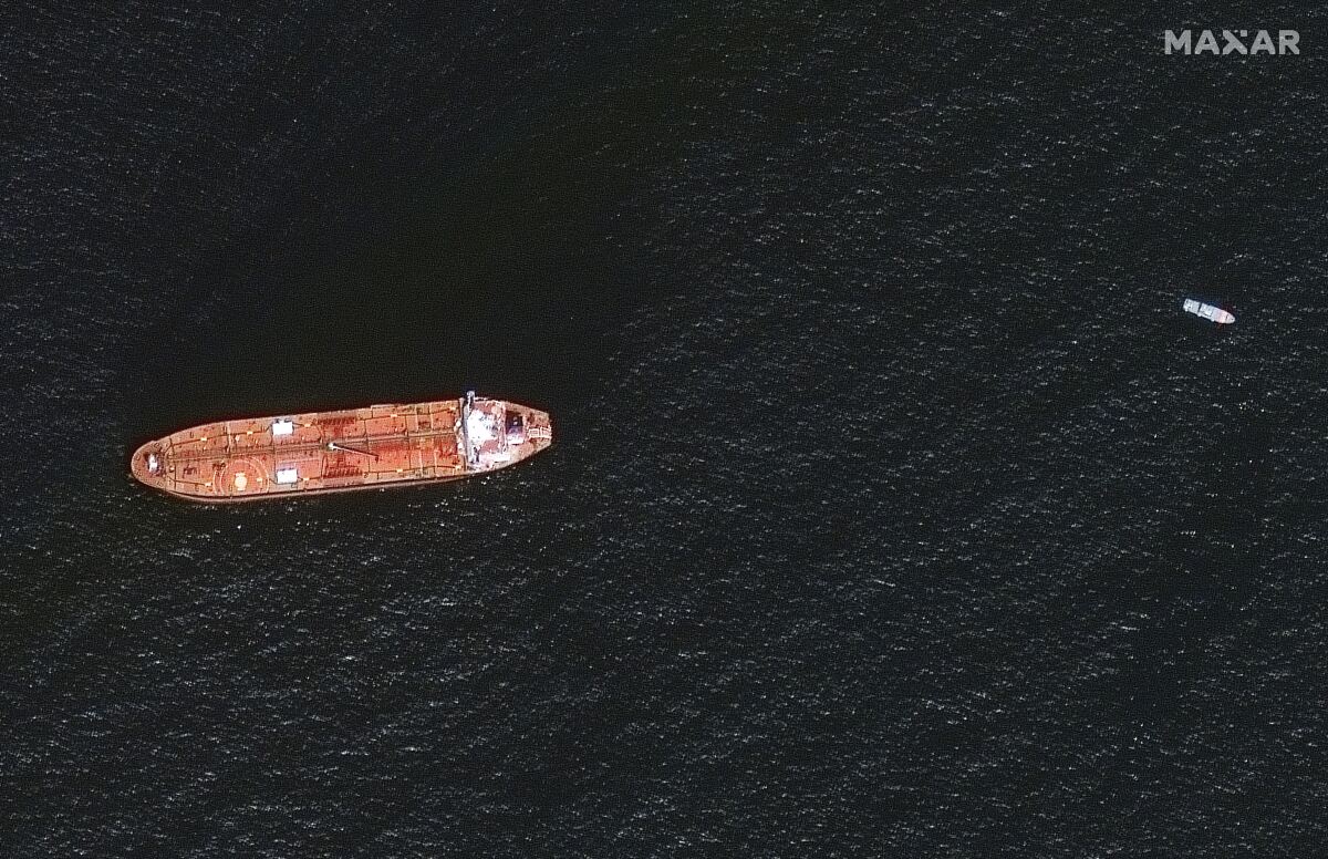 In this image provided by Maxar Technologies, the oil tanker Mercer Street is seen off the coast of Fujairah, United Arab Emirates, Wednesday Aug. 4, 2021. The United States, United Kingdom and Israel blame Iran for an attack on the Mercer Street off Oman that killed two people amid tensions over Tehran's tattered nuclear deal with world powers. Iran has denied being involved. (Satellite image ©2021 Maxar Technologies via AP)