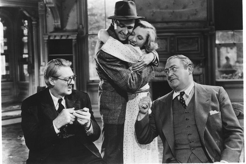 L–R: LIONEL BARRYMORE, JIMMY STEWART, JEAN ARTHUR & EDWARD ARNOLD in the movie YOU CAN'T TAKE IT WITH YOU. It won an Academy Award for Best Picture in 1938. courtesy Universal City Studios, Inc.