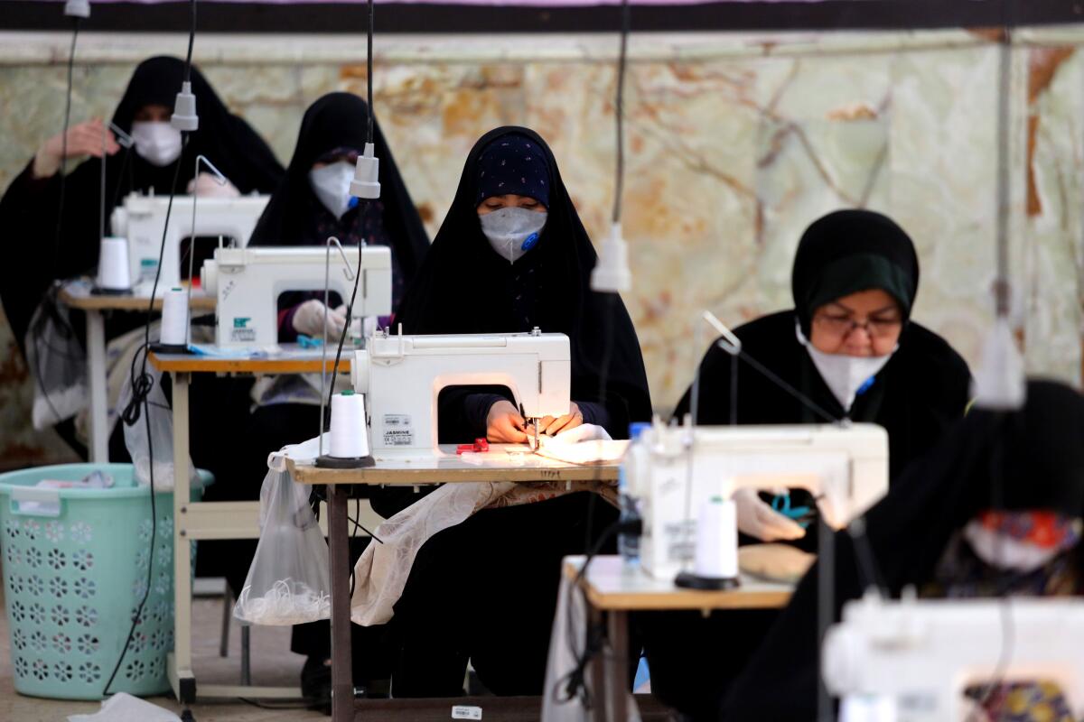 Iranians sew protective masks 