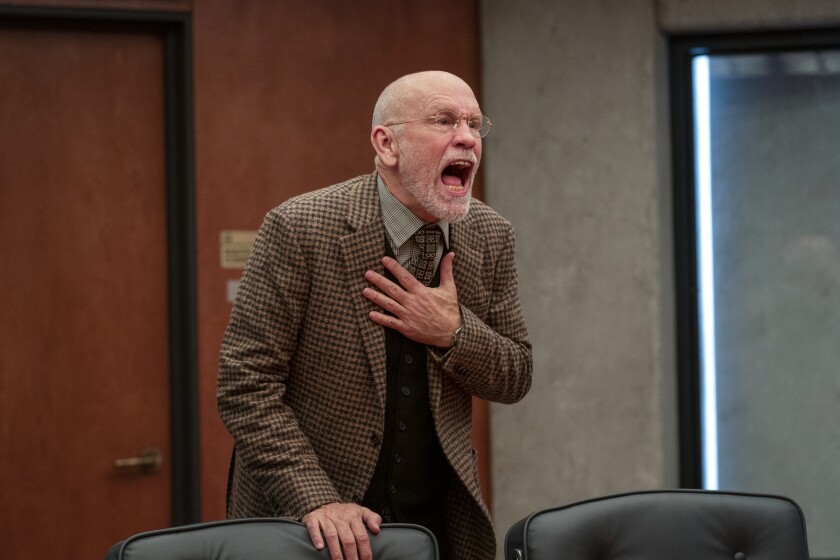 John Malkovich has a trying moment in the Netflix comedy 