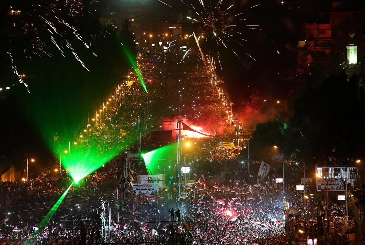 Fireworks light up the sky as opponents of ousted Egyptian President Mohamed Morsi celebrate in Cairo, Egypt.