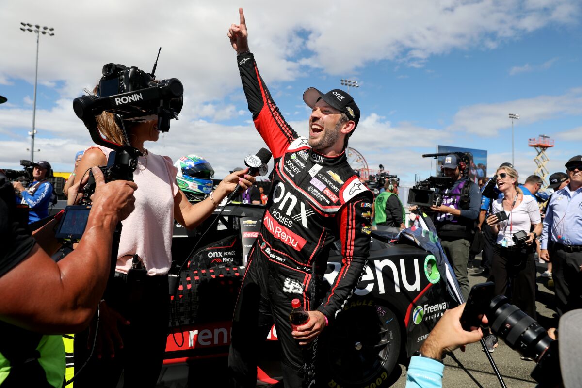 Daniel Suárez celebrates during a post-race interview after winning the Toyota / Save Mart 350 at Sonoma Raceway.