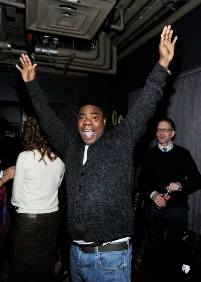 Tracy Morgan suffered a medical scare at the Sundance Film Festival on Sunday when he lost consciousness after an awards ceremony. The comedian's publicist, Lewis Kay, quickly ruled out drugs and alcohol, blaming the collapse on altitude and exhaustion instead. However, the trip to the hospital didn't keep Morgan out of commission. The actor was back in New York by Tuesday and tweeting jabs at costar Alec Baldwin. "On the set of 30 Rock, just walked past @alecbaldwin and said Top That!," he wrote, referencing Baldwin's recent kerfuffle with a certain airline.