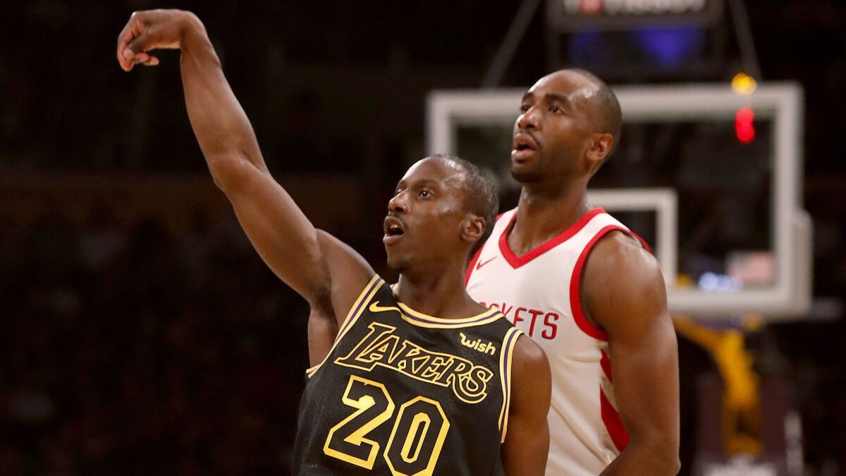 Andre Ingram follows through on a three-point shot against the Rockets in the second quarter on April 10, 2018 at Staples Center.
