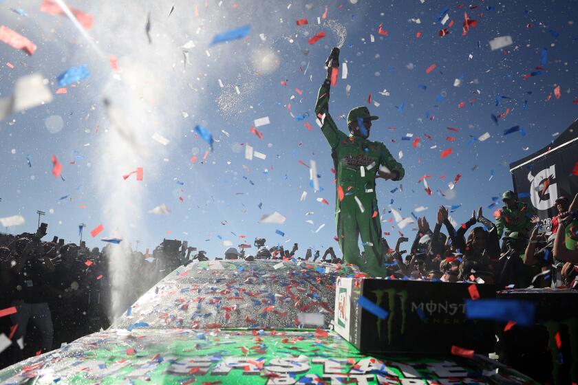 FONTANA, CA - MARCH 17: Kyle Busch, driver of the #18 Interstate Batteries Toyota, celebrates in victory lane after winning the Monster Energy NASCAR Cup Series Auto Club 400 and winning his 200th NASCAR race at Auto Club Speedway on March 17, 2019 in Fontana, California. (Photo by Chris Graythen/Getty Images)