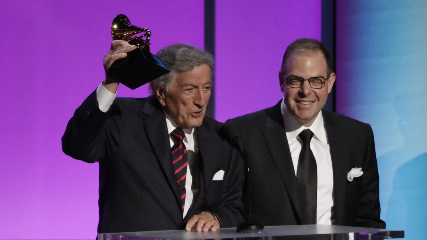 Tony Bennett and Bill Charlap accept the Grammy for traditional pop vocal album for "Tony Bennett & Bill Charlap, the Silver Lining: The Songs of Jerome Kern."
