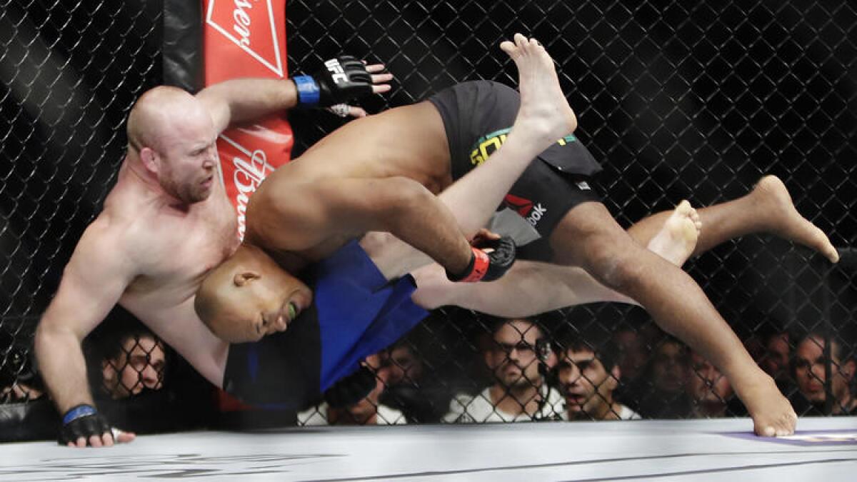 Ronaldo Souza takes down Tim Boetsch during their middleweight bout at UFC 208.