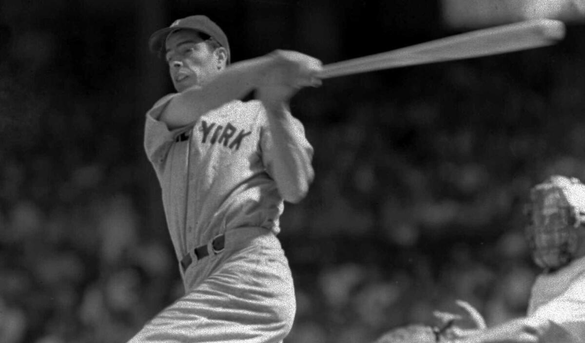 New York Yankees legend Joe DiMaggio lines a single to left field during a game against Washington in June 1941.