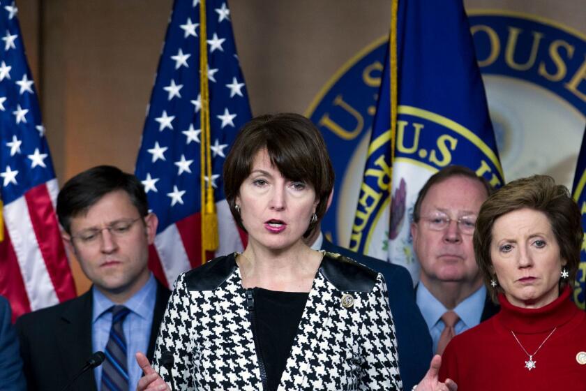 Rep. Cathy McMorris Rodgers, R-Wash., accompanied by other members of Congress, speaks during a news conference Saturday, Jan. 20, 2018, at Capitol Hill in Washington. The federal government shut down at the stroke of midnight Friday, halting all but the most essential operations. (AP Photo/Jose Luis Magana)