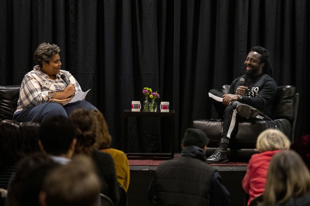 Writer and editor Roxanne Gay interviews author Marlon James discussing James' latest book "Black Leopard, Red Wolf," at the Museum of African American Art in Los Angeles on Feb 20.