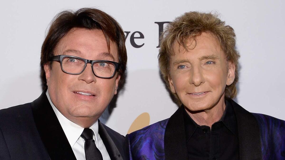 Garry Kief, left, and Barry Manilow in February 2016.