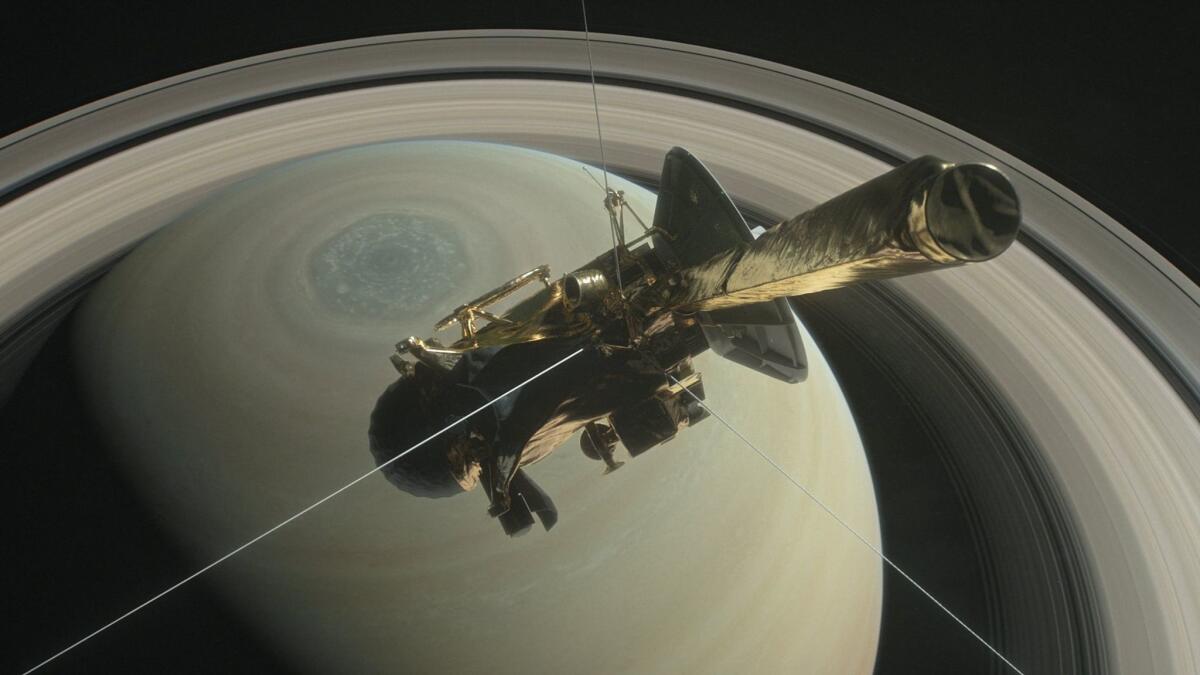 epa05928282 (FILE) - An undated handout photo made available by NASA shows an illustration of NASA's Cassini spacecraft above Saturn's northern hemisphere prior to one of its 22 grand finale dives, in Space (reissued 26 April 2017). On 26 April 2017, the spacecraft will make the first in a series of 22 dives through the 2,400km gap between Saturn and its rings as part of its mission's grand finale. The spacecraft will then end its expedition on 15 September 2017, with a final plunge into the gas giant. The operation aims at gaining insights into the planet's structure and atmosphere as well as at capturing views of its inner rings. NASA's Cassini spacecraft is in orbit around Saturn since 2004. EPA/NASA/JPL-Caltech HANDOUT HANDOUT EDITORIAL USE ONLY/NO SALES ** Usable by LA, CT and MoD ONLY **