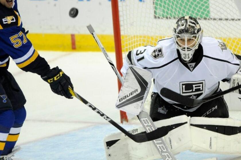 Kings goalie Peter Budaj blocks a shot from St. Louis' David Perron during the second period of a game on Oct. 29.