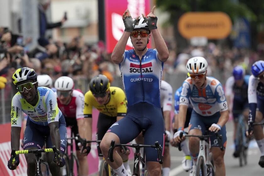 Belgium's Tim Merlier of Soudal Quick-Step team celebrates as he won the third stage of the Giro d'Italia from Novara to Fossano, Italy, May 06, 2024. (Photo by Gian Mattia D'Alberto/LaPresse via AP)