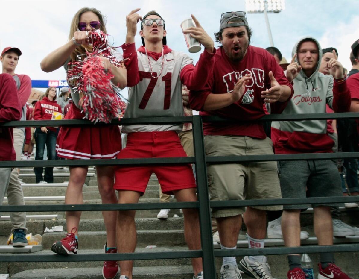 Washington State fans get rowdy during a game against the Oregon State Beavers at Martin Stadium in Pullman, Wash., on Sept. 16.